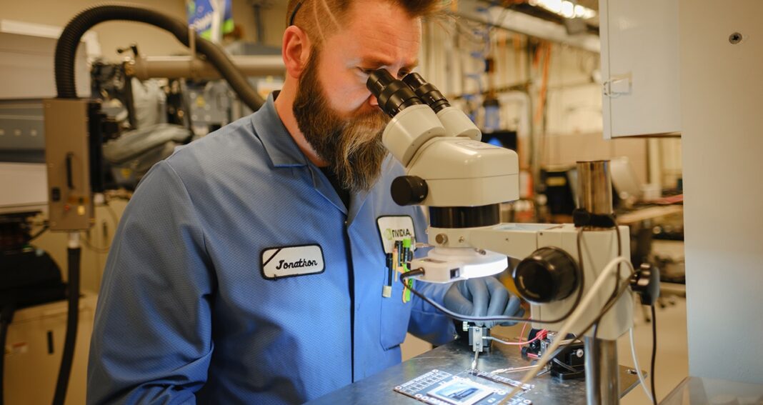 A member of Nvidia’s failure analysis team at work in the company's Santa Clara, CA, lab.